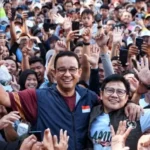 Anies Baswedan dan Muhaimin Iskandar di tengah lautan massa pendukungnya