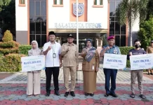 Pemberian santunan jaminan ketenagakerjaan kepada pegawai non-ASN Pemkot Depok (Foto: Dok. BPJS Ketenagakerjaan Depok)