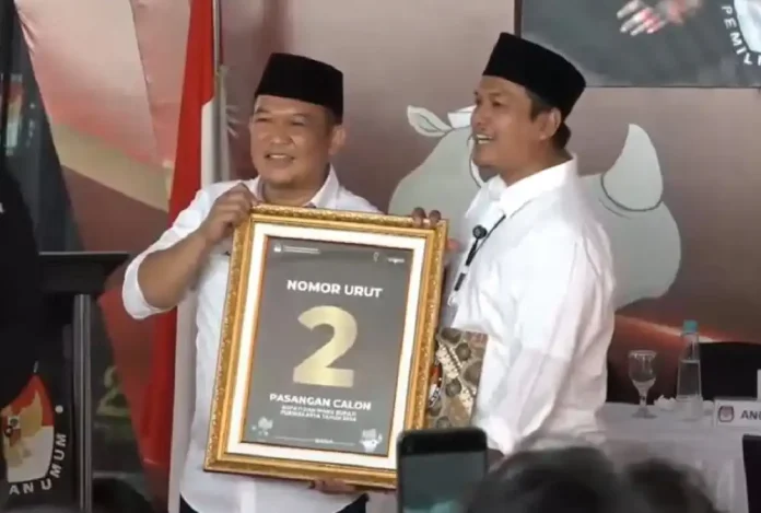 Pasangan calon bupati dan wakil bupati Purwakarta nomor urut 2, Yadi Rusmayadi – Pipin Sopian, yang akan kontestasi dalam Pilkada Purwakarta 2024 (Foto: Tangkapan layar akun YouTube KPU Kabupaten Purwakarta)