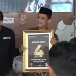 Pasangan calon bupati dan wakil bupati Purwakarta, Zainal Arifin dan Sona Maulida Roemardie (Zainal-Sona) yang mendapatkan nomor urut 4 dalam Pilkada Purwakarta 2024. (Foto: Tangkapan layar YouTube KPU Kabupaten Purwakarta)